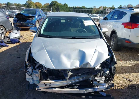 2021 Toyota Prius L Eco z USA, uszkodzony, nr VIN JTDKAMFU9M3143122